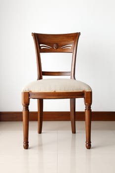 a wooden chair with fabric cushion