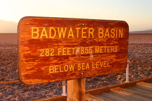 Sign at the Badwater Basin of California marking the lowest elevation in North America 