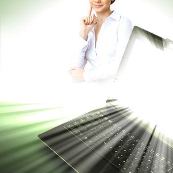 Image of notebook with shining screen and light