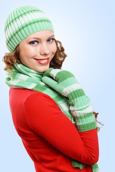 Young pretty woman with lomng hair wearing warm pullover