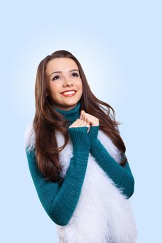 Young pretty woman with lomng hair wearing warm pullover