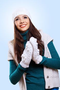 Young pretty woman with lomng hair wearing warm pullover