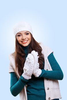 Young pretty woman with lomng hair wearing warm pullover