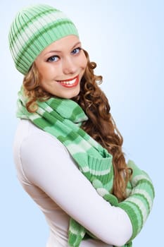 Young pretty woman with lomng hair wearing warm pullover