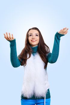 Young pretty woman with lomng hair wearing warm pullover