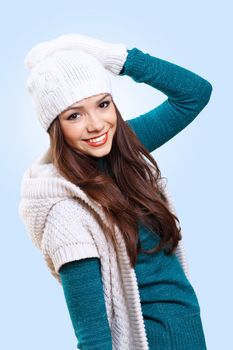 Young pretty woman with lomng hair wearing warm pullover