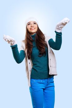 Young pretty woman with lomng hair wearing warm pullover