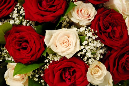 Flower bouquet of red and pink roses. 