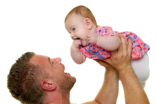 Baby and father are playing. The baby 3 month old. Isolated on a white background.