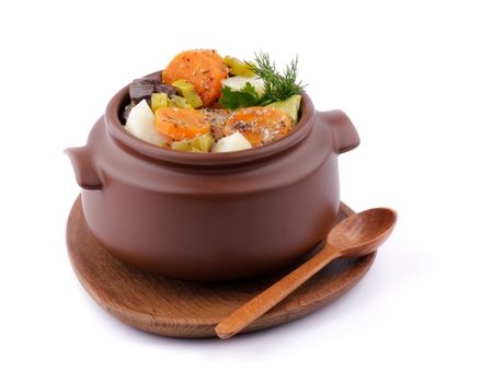 Vegetable Stew in Brown Pot on Wooden Plate with Spoon isolated on white background