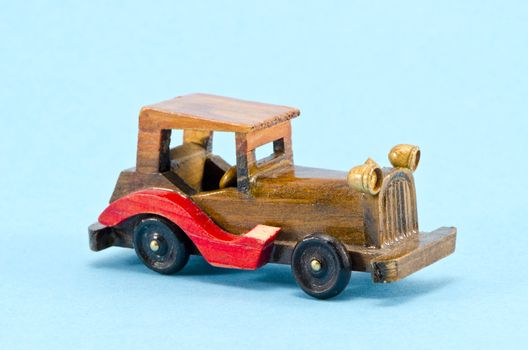 wooden old car model an azure background