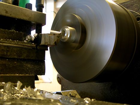           turning lathe with metal chips