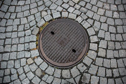 Manhole sewer cover and bricks