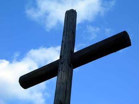 Old wooden Cross and the sky 