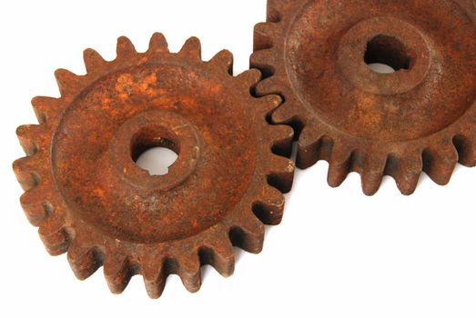 Old rusty gear cogs isolated on white background