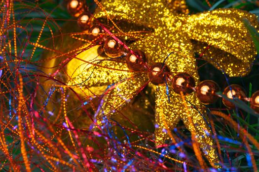 Christmas Tree Decorated with Bright Tinsel, closeup