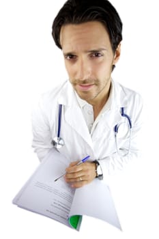 Male doctor looking reading medical paper