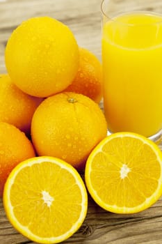 fresh and  healthy tasty orange juice on wooden background