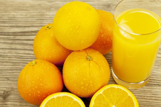 fresh and  healthy tasty orange juice on wooden background