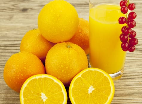 fresh and  healthy tasty orange juice on wooden background