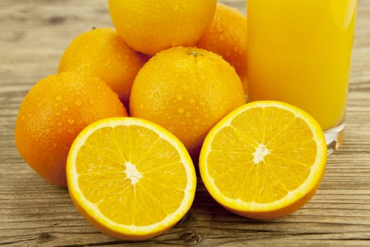 fresh and  healthy tasty orange juice on wooden background