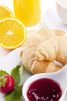 traditional french breakfast croissant isolated on white background