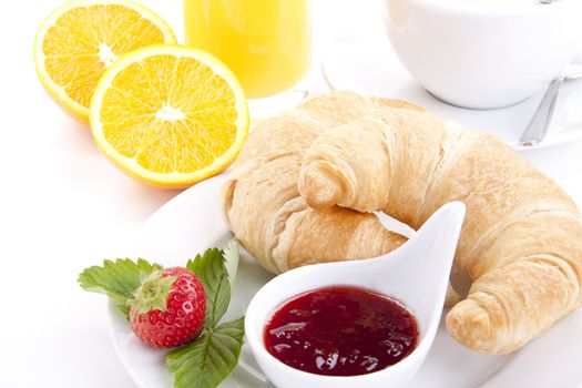 traditional french breakfast croissant isolated on white background
