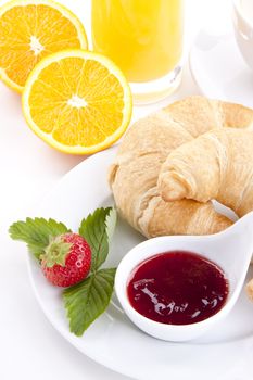 traditional french breakfast croissant isolated on white background