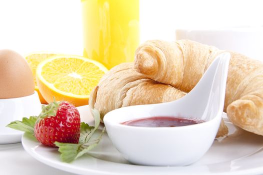 traditional french breakfast croissant isolated on white background