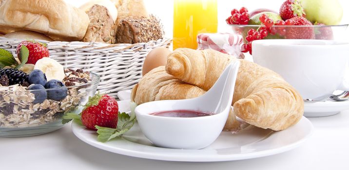 traditional french breakfast croissant isolated on white background