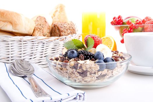 deliscious healthy breakfast with flakes and fruits isolated on white background