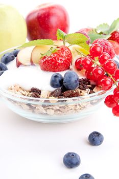 deliscious healthy breakfast with flakes and fruits isolated on white background