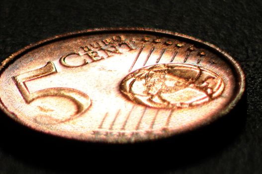 A collage of 5 euro cent coin