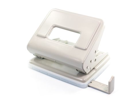 Paper puncher on white background isolate