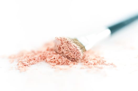 close up of a make up powder on white background isolate