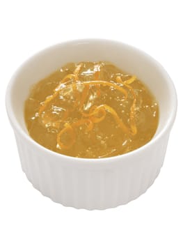 close up of a cup of orange marmalade