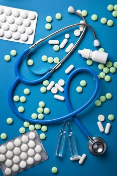 stethoscope and pills