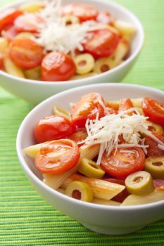 pasta with tomatoes and salami