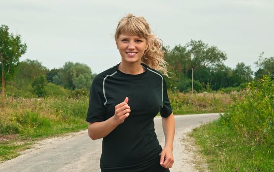girl runs on road