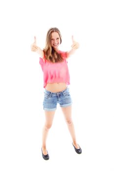 Casual young girl with a lovely smile giving a double thumbs up of enthusiasm and motivation isolated on white 
