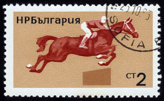 BULGARIA - CIRCA 1965: stamp printed in Bulgaria, shows equestrian sport, triathlon, circa 1965
