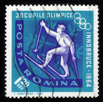 ROMANIA - CIRCA 1963: A stamp printed in Romania shows a ski competition on a Olympic Games in Innsbruck, Austria, circa 1963