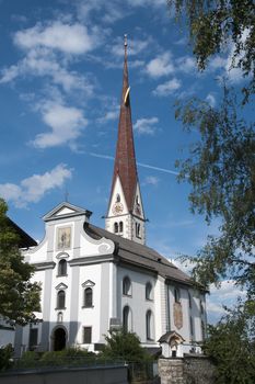 blue sky and the church in axam austria