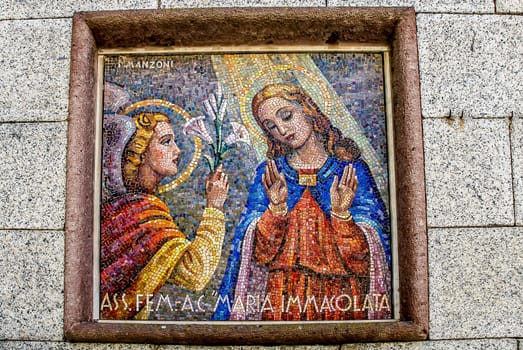 Mosaic outside the wall of a church in the town of Nuoro in Sardinia