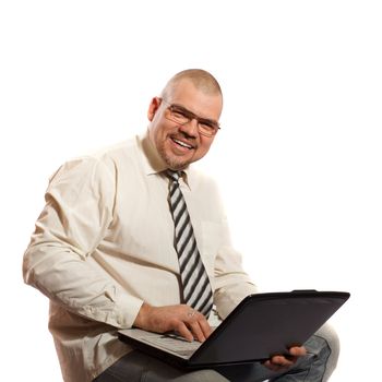 smiling man working on computer-on a white background