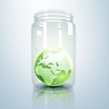 Image of our planet earth inside a glass jar