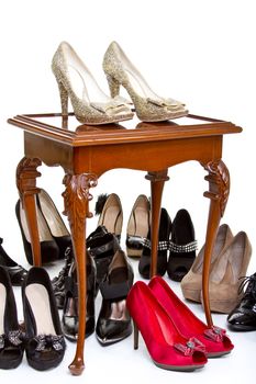 High heels in different colours on table 