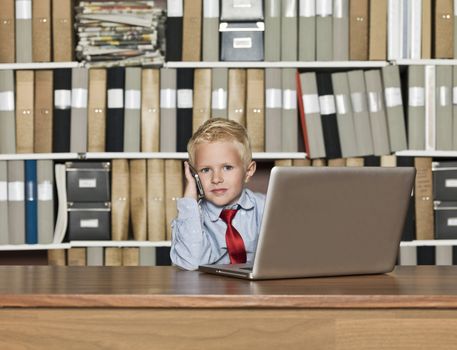 Young Businessman on the phone at the office