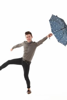 Handsome man with a blue umbrella with stars