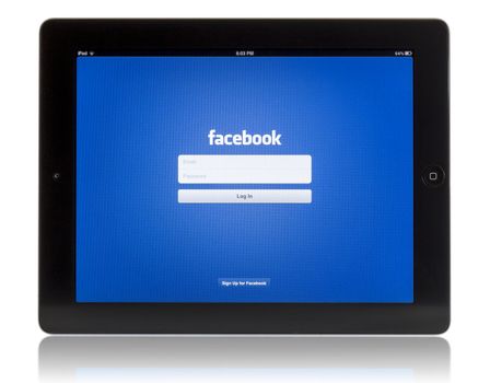 Galati, Romania - August 18, 2012: The New iPad displaying login screen of Facebook application. Studio shot on white background. 